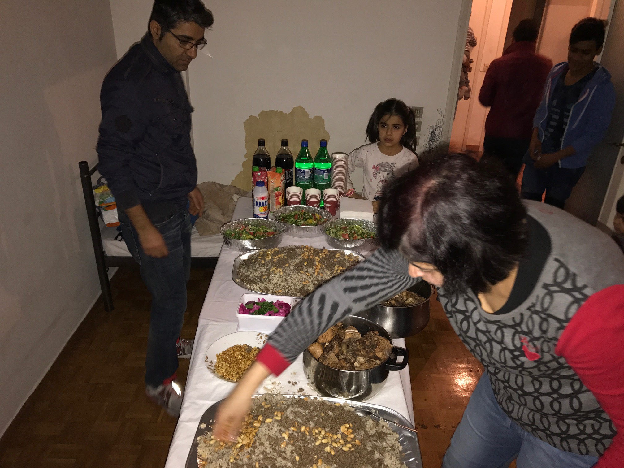 Rostom cooks for other refugees with us 