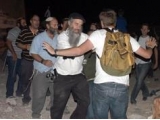 Israeli settlers prevent a Christian service in Beit Sahour, assault worshippers